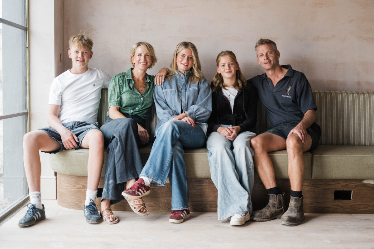 A family enjoying the communal atmosphere at Barnsgrove Wellness Club.