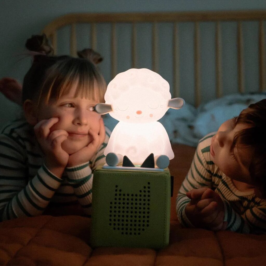A sleep sheep night light and sound machine designed for a baby's nursery.