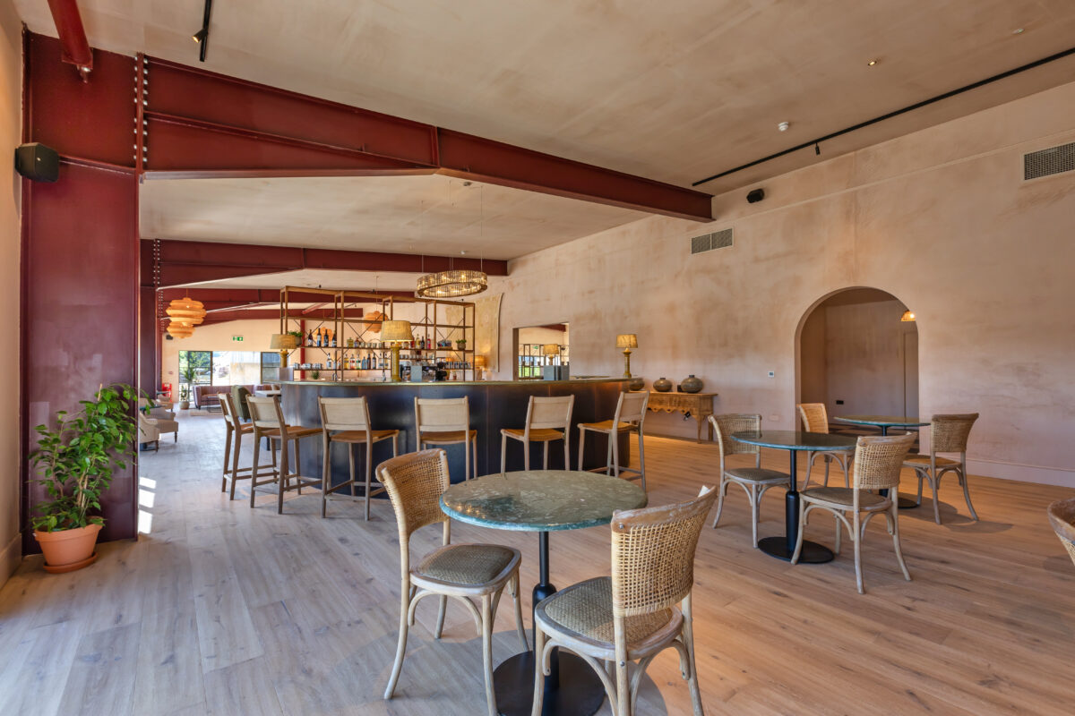 Interior of Palmers Bar featuring elegant decor and a social seating area.