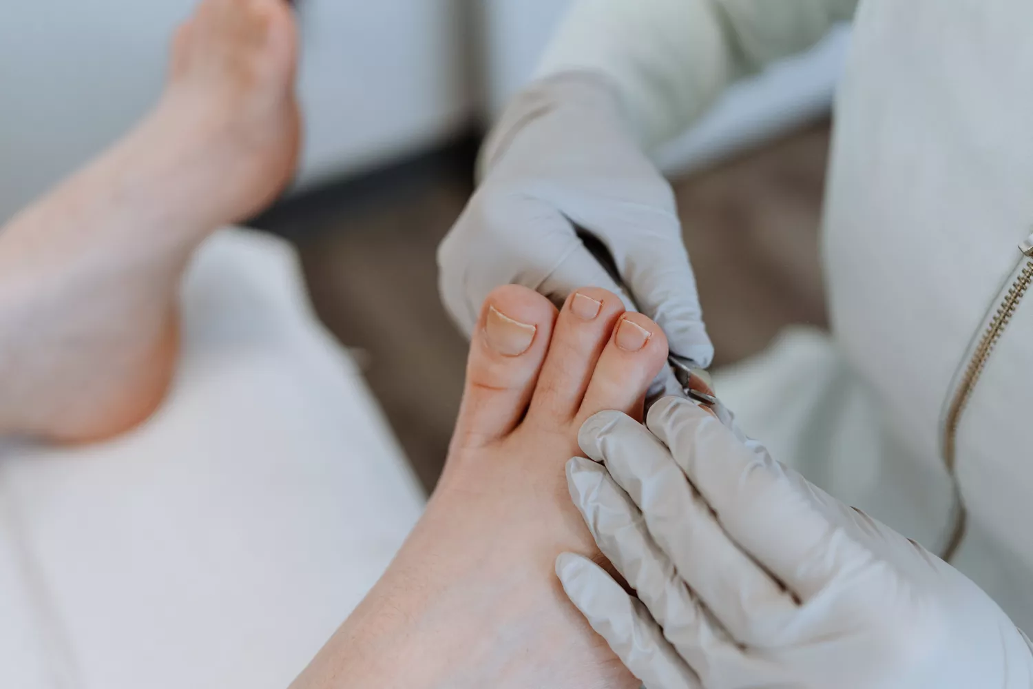 A person receiving a pedicure as a form of relaxation and self-care.