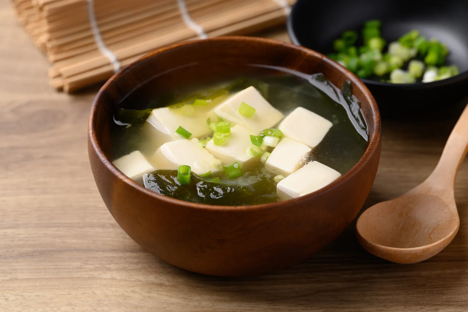 Traditional Japanese miso soup with tofu and seaweed.