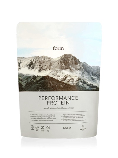 A tub of Form Performance Protein powder.