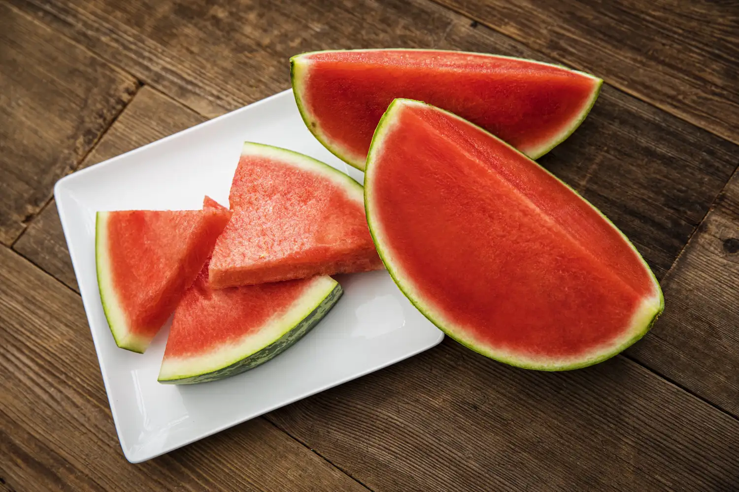 Close-up of sliced watermelon on a plate.