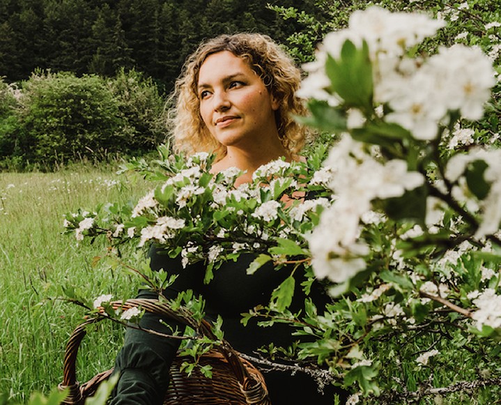 Expert herbalist Seraphina Capranos preparing the spring liver tincture recipe.