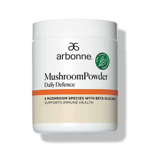 Arbonne Daily Defence supplement bottle focused on immune support through mushrooms.
